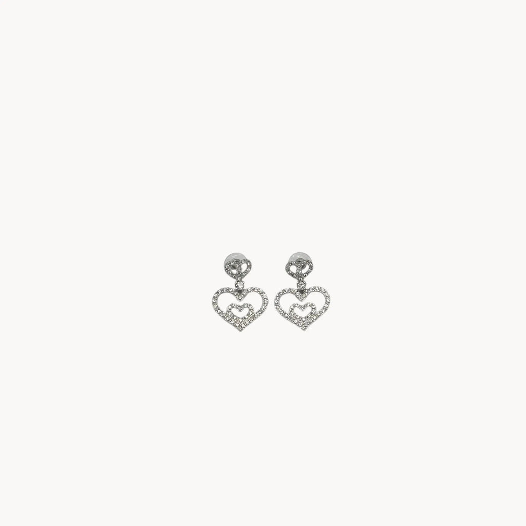 Vintage Nolan Miller rhinestone heart dangle pierced earrings with double open-heart design.
