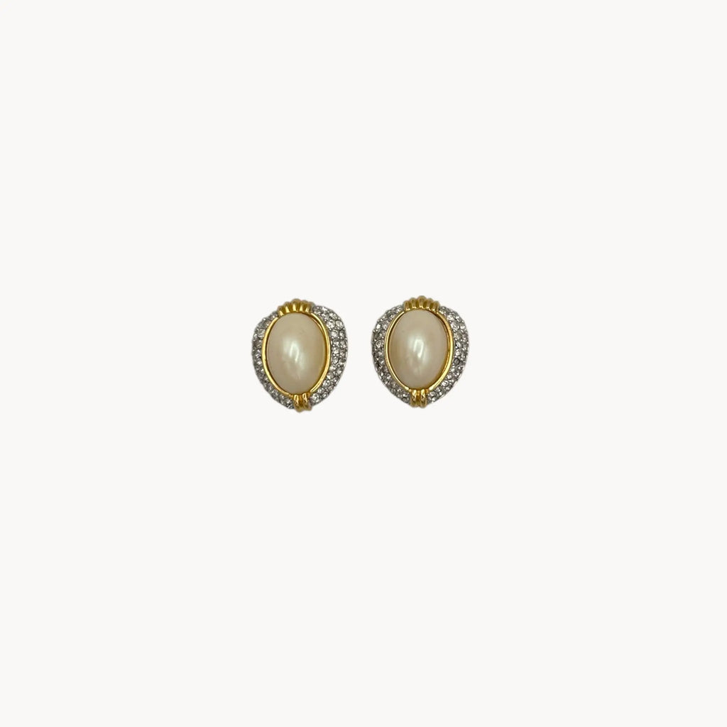 Richelieu gold-tone faux pearl clip-on earrings with rhinestone accents, vintage jewelry on white background.