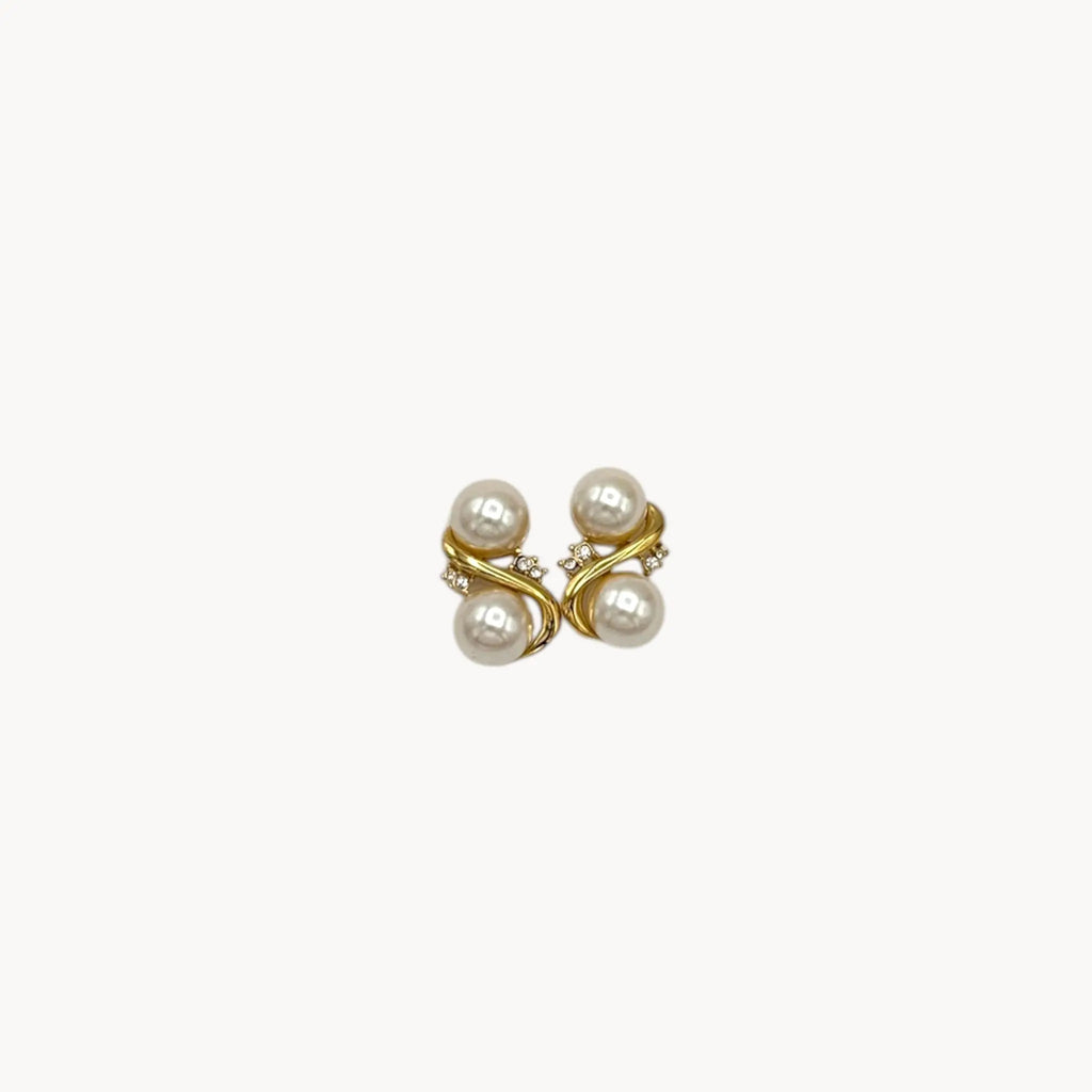 Richelieu vintage gold tone pierced earrings with double faux pearls and rhinestone accents, elegant 1980s bridal jewelry shown on white background.