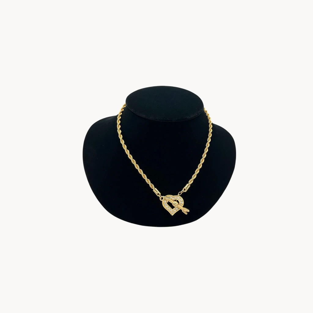 Swarovski gold rope chain necklace with pave heart toggle clasp.