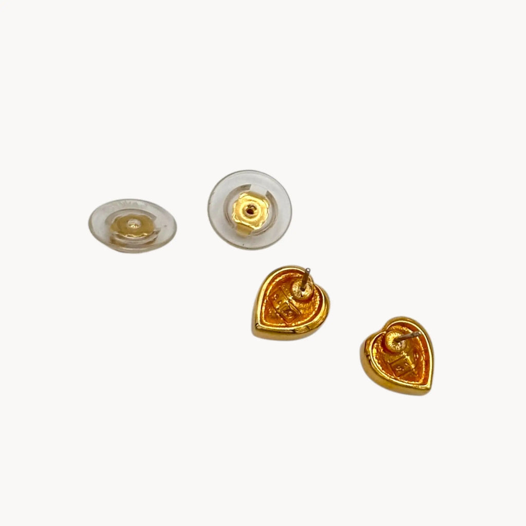 Back view of Swarovski SAL vintage red crystal heart pierced earrings with gold-tone setting.