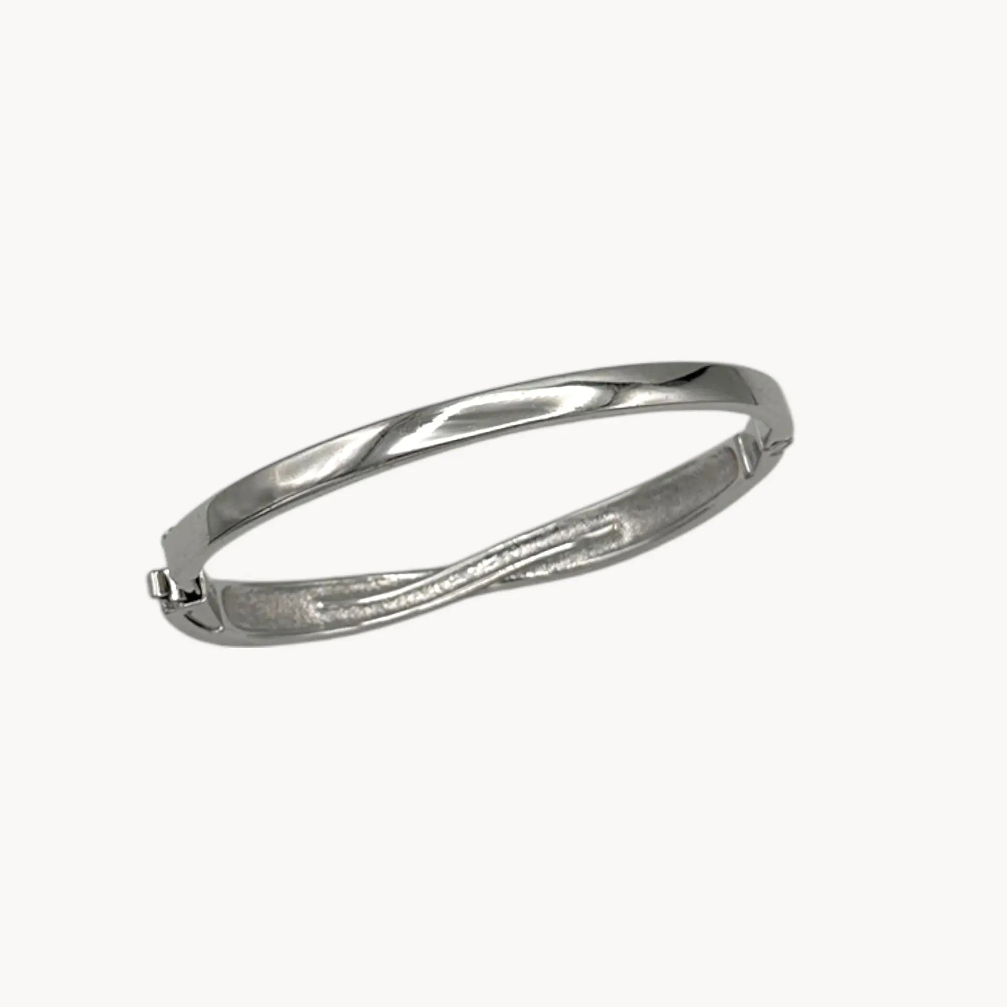Back view of Swarovski silver-tone crystal bangle bracelet with elegant sparkling design.