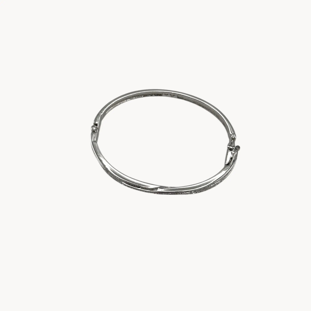 Top view of Swarovski silver-tone crystal bangle bracelet with elegant sparkling design.