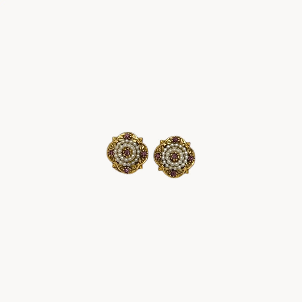 Victorian revival gold clip-on earrings with faux pearls and purple rhinestones.