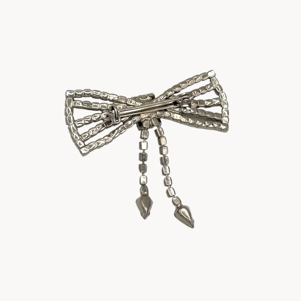 Back view of Vintage Art Deco style rhinestone bow brooch with dangle drops.
