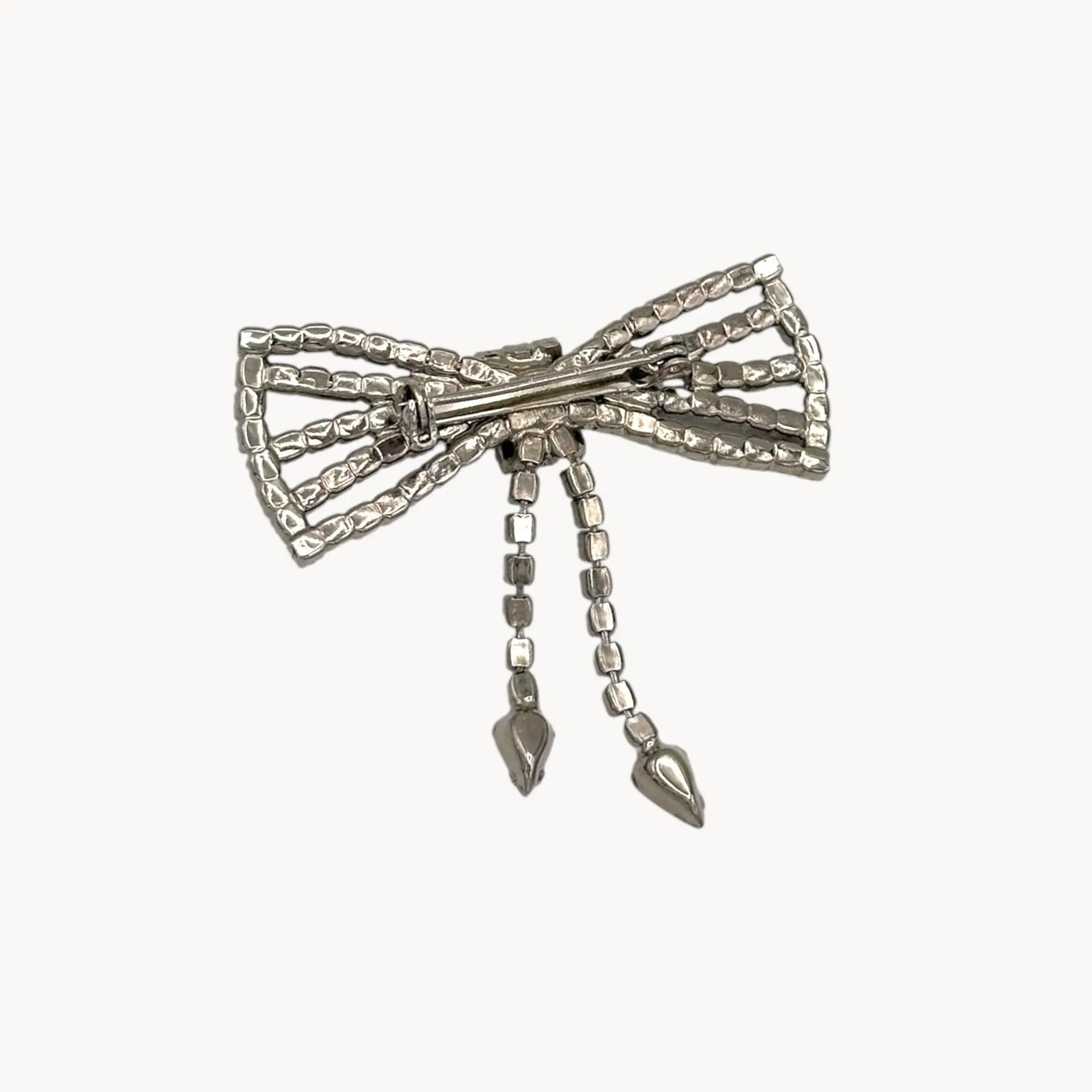 Back view of Vintage Art Deco style rhinestone bow brooch with dangle drops.