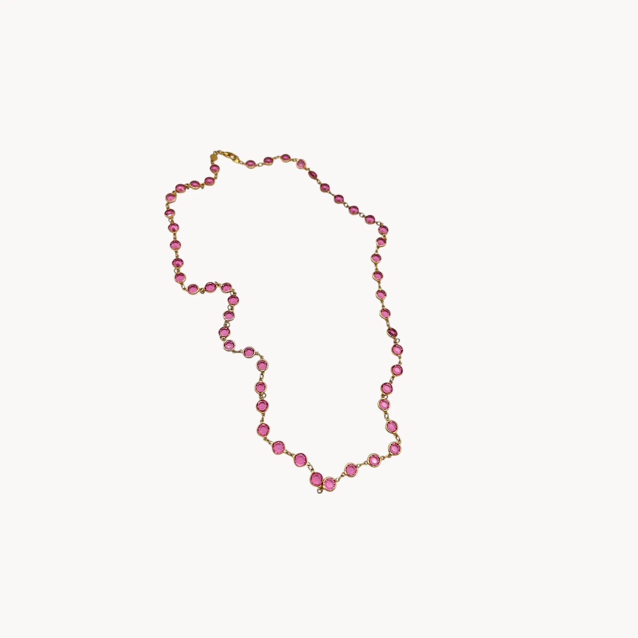 Vintage Austrian pink crystal bezel-set long necklace with gold-tone chain, 1980s bridal or evening jewelry.