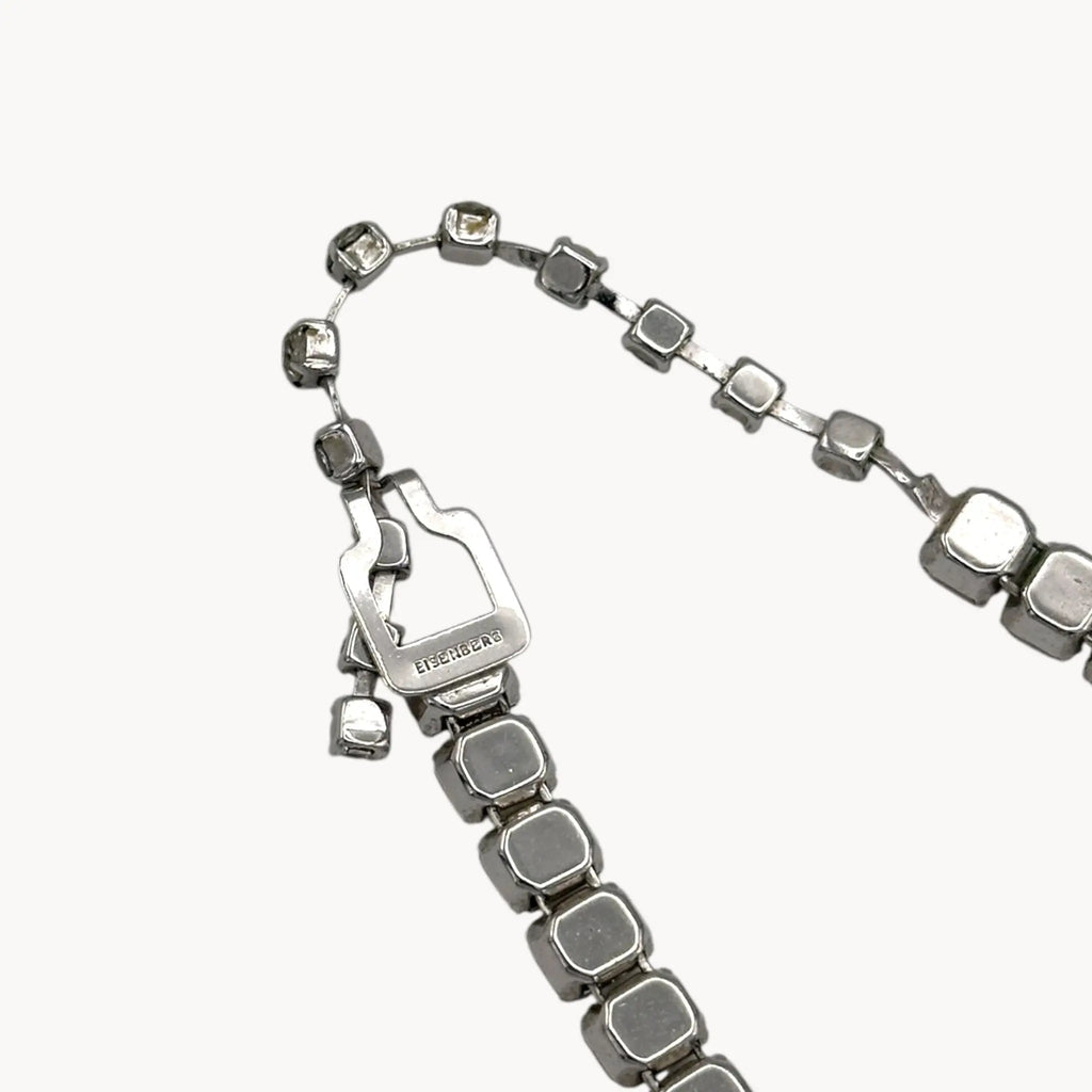 Clasp view of Eisenberg Rhinestone vintage necklace against a white background.