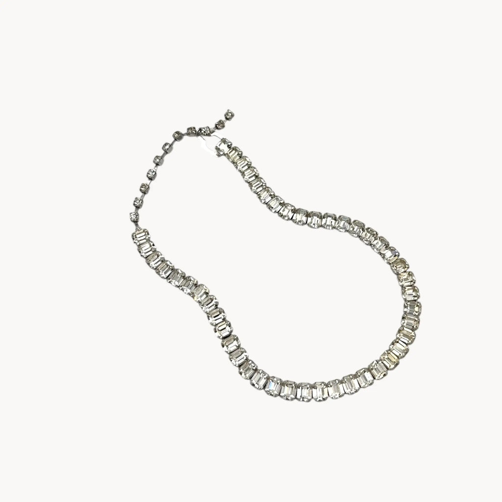 Eisenberg Rhinestone vintage necklace against a white background.