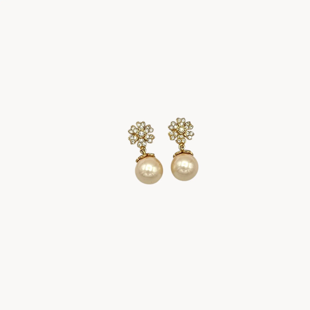 Vintage unmarked clip-on earrings with crystal floral tops and faux pearl drops, 1990s bridal jewelry.