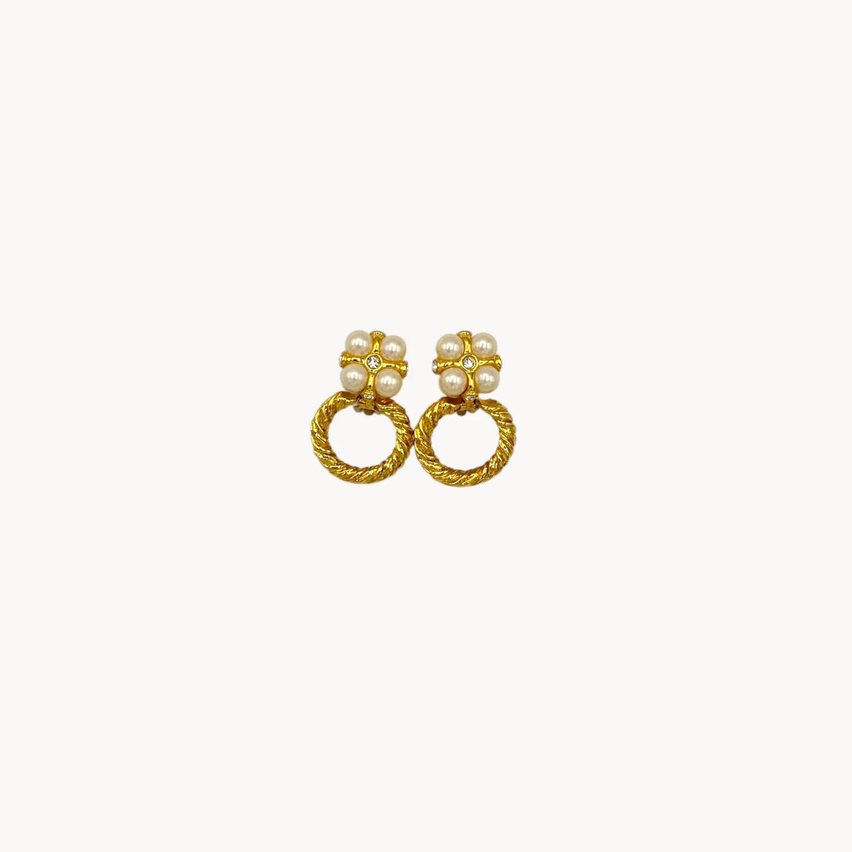 Vintage unmarked gold door knocker clip-on earrings with faux pearl clusters and crystal accents.