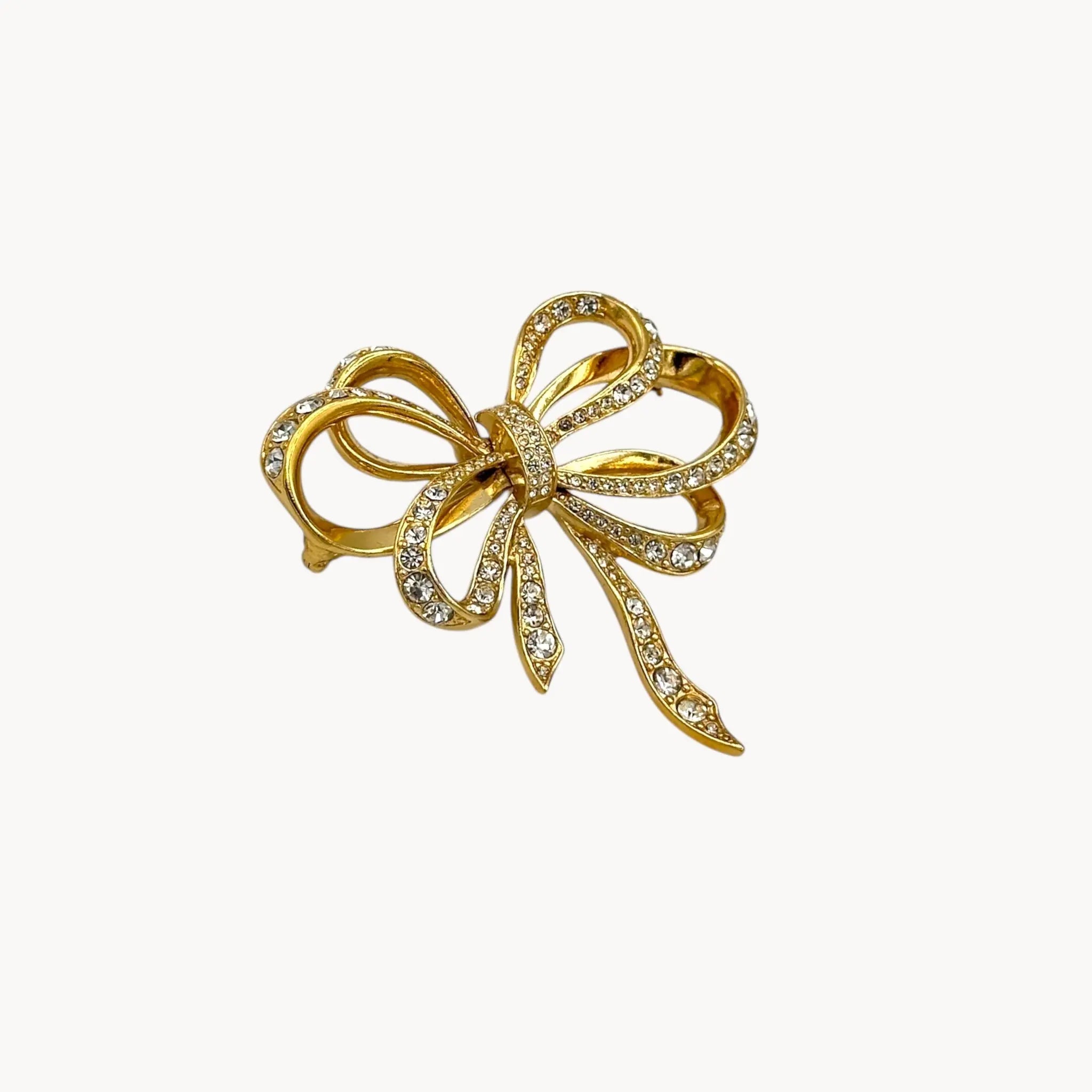 Side view Vintage Kenneth Jay Lane gold and crystal pavé bow brooch