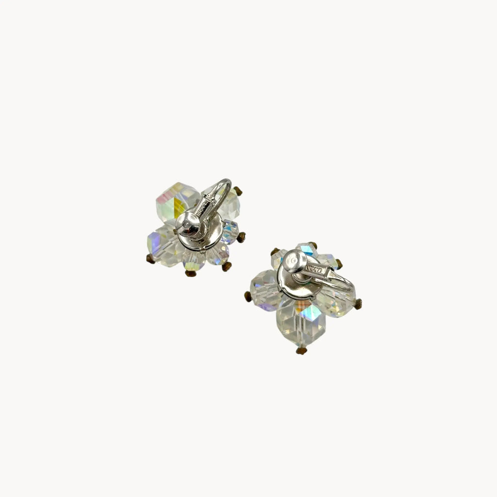 Back view of 1950s Laguna crystal cluster clip-on earrings with aurora borealis finish, vintage bridal jewelry