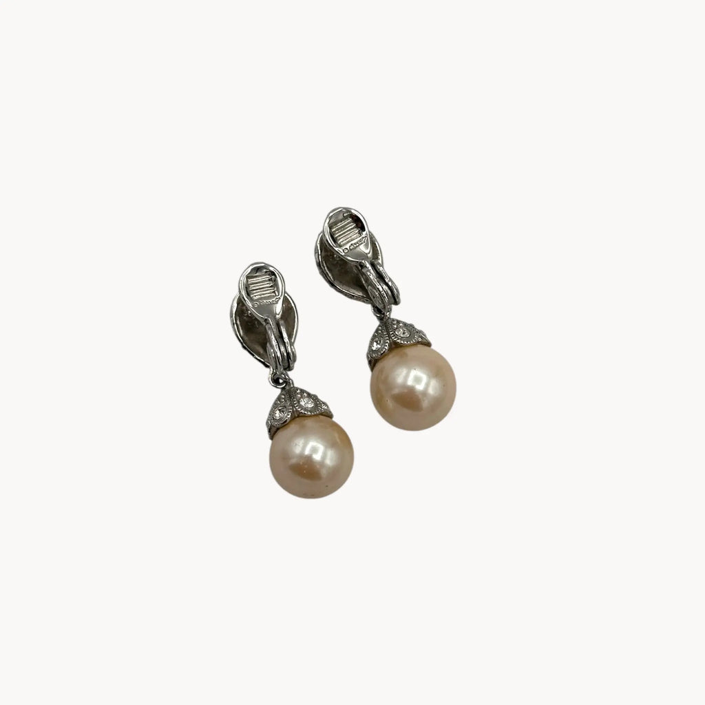 Back view Vintage Monet clip-on earrings with faux pearls and pavé crystal accents, 1980s–1990s bridal jewelry.