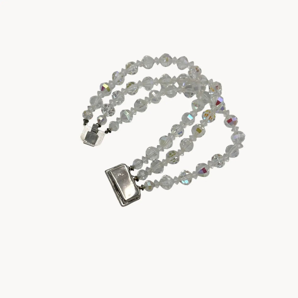 Back view of Vintage unsigned multi-strand faceted crystal bracelet with rhinestone clasp in Art Deco style.