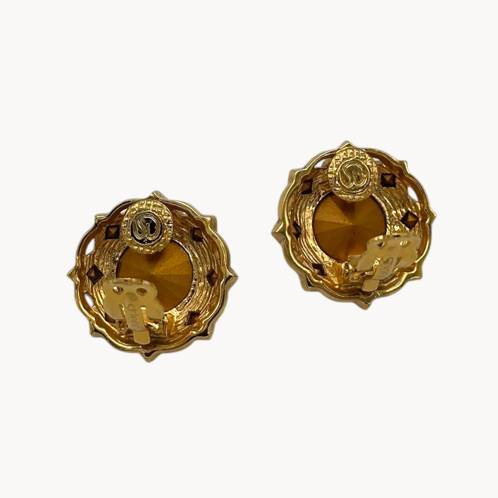 Back view with clips up of Vintage St. John clip-on earrings with round crystal centers and square-cut crystal frame in gold-tone setting, bridal jewelry.