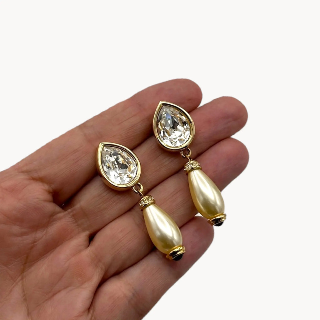 Scale size view of Swarovski Crystal & Faux Pearl Drop Pierced Earrings on white background.