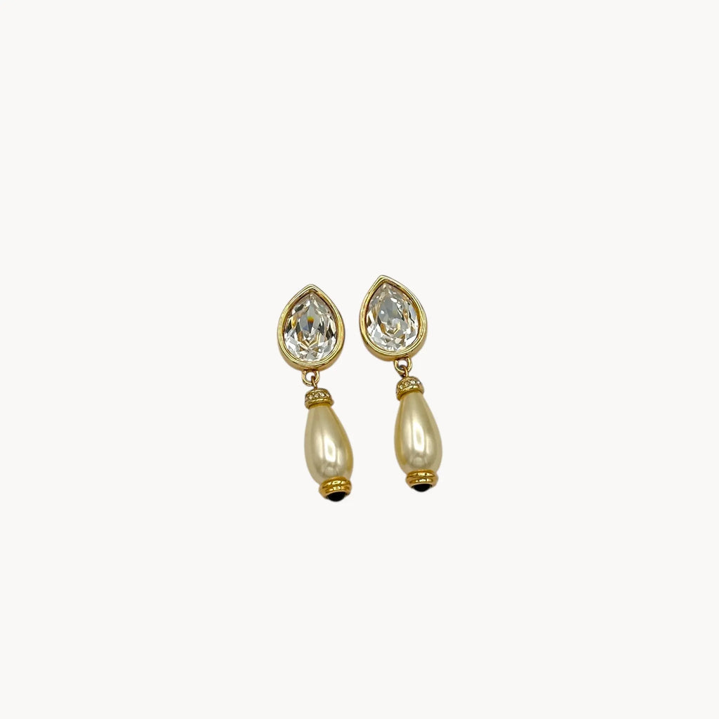 Close up of Swarovski Crystal & Faux Pearl Drop Pierced Earrings on white background.