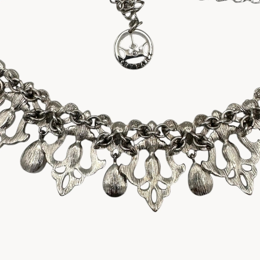 Back view of Vintage 1990s Trifari rhinestone statement necklace with teardrop accents