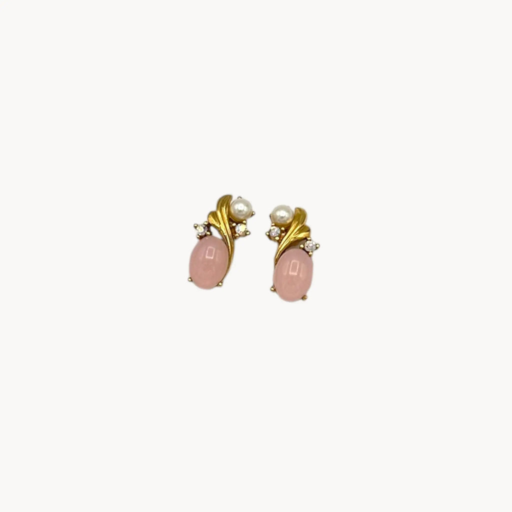Vintage Trifari pierced earrings with pink cabochon stones, faux pearls, and crystal accents.