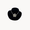 Large Trifari Rhinestone Floral Necklace on black bust.