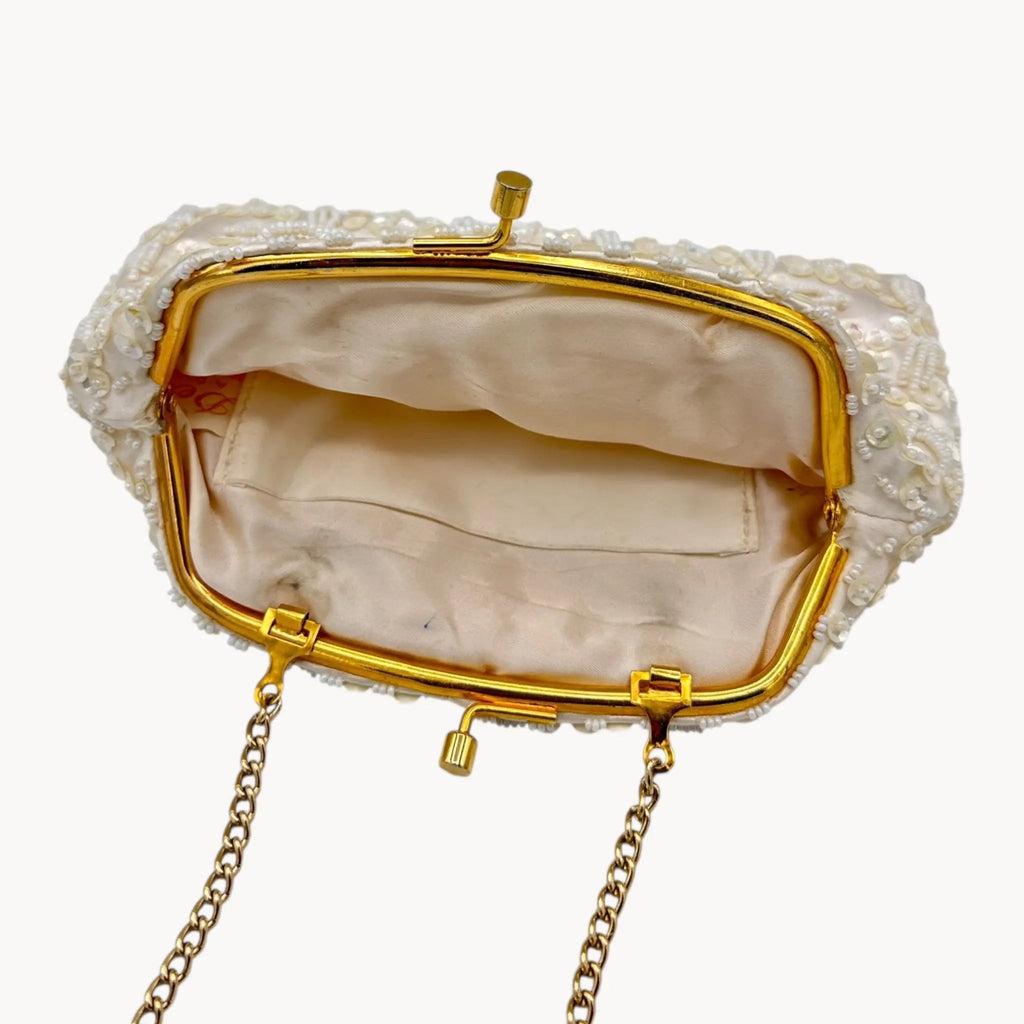 Inside view of Vintage white sequined beaded handbag with gold chain handle and kiss-lock clasp