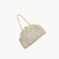 Vintage white sequined beaded handbag with gold chain handle and kiss-lock clasp