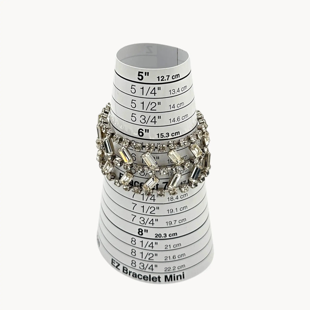 On sizer view of Vintage wide rhinestone bracelet with round and baguette-cut stones
