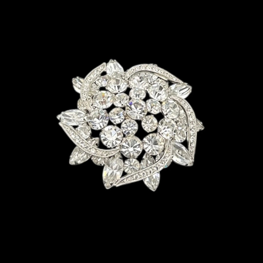 Rhinestone brooch with crystal stones on a black background