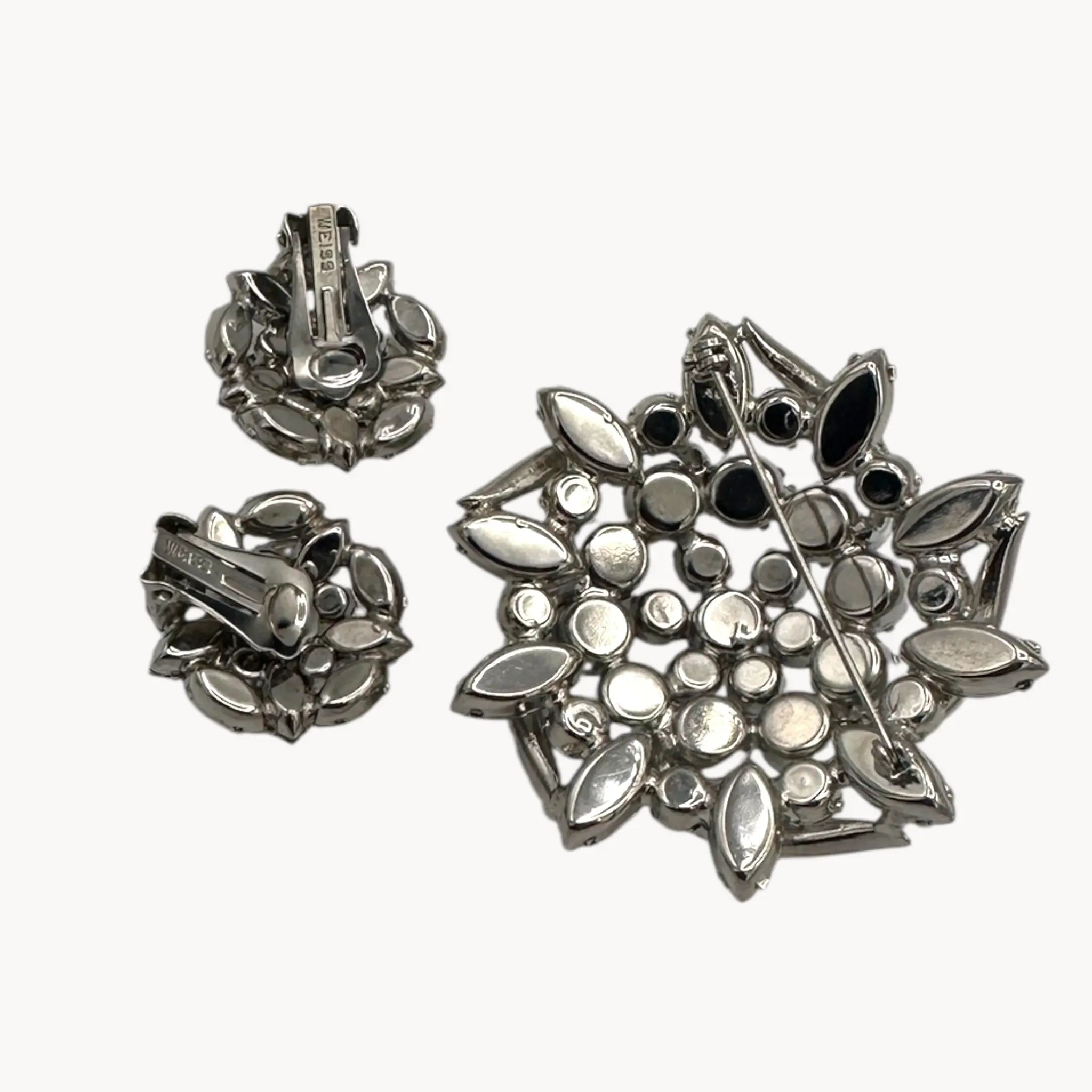 Back view of Weiss rhinestone brooch and earring set with vintage floral design