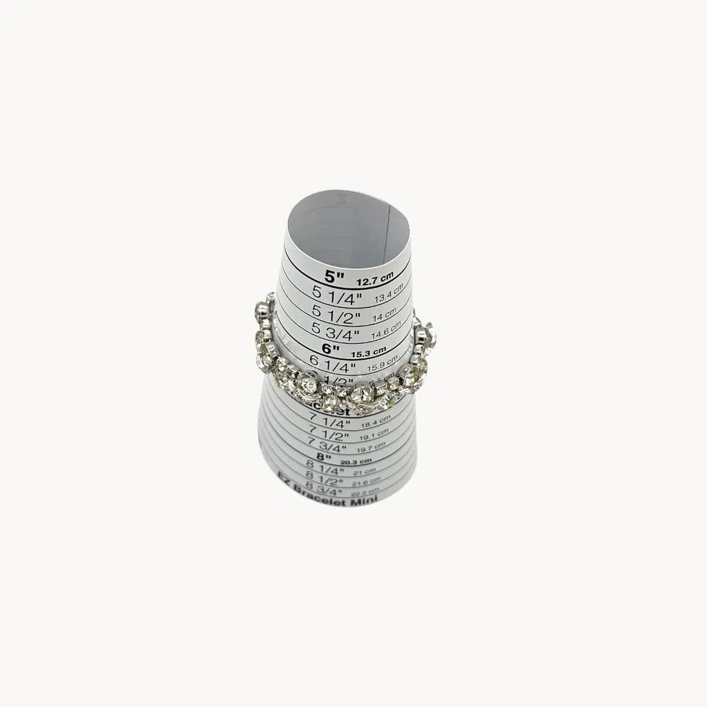 On sizer view of Vintage Weiss rhinestone statement bracelet with large prong-set stones.