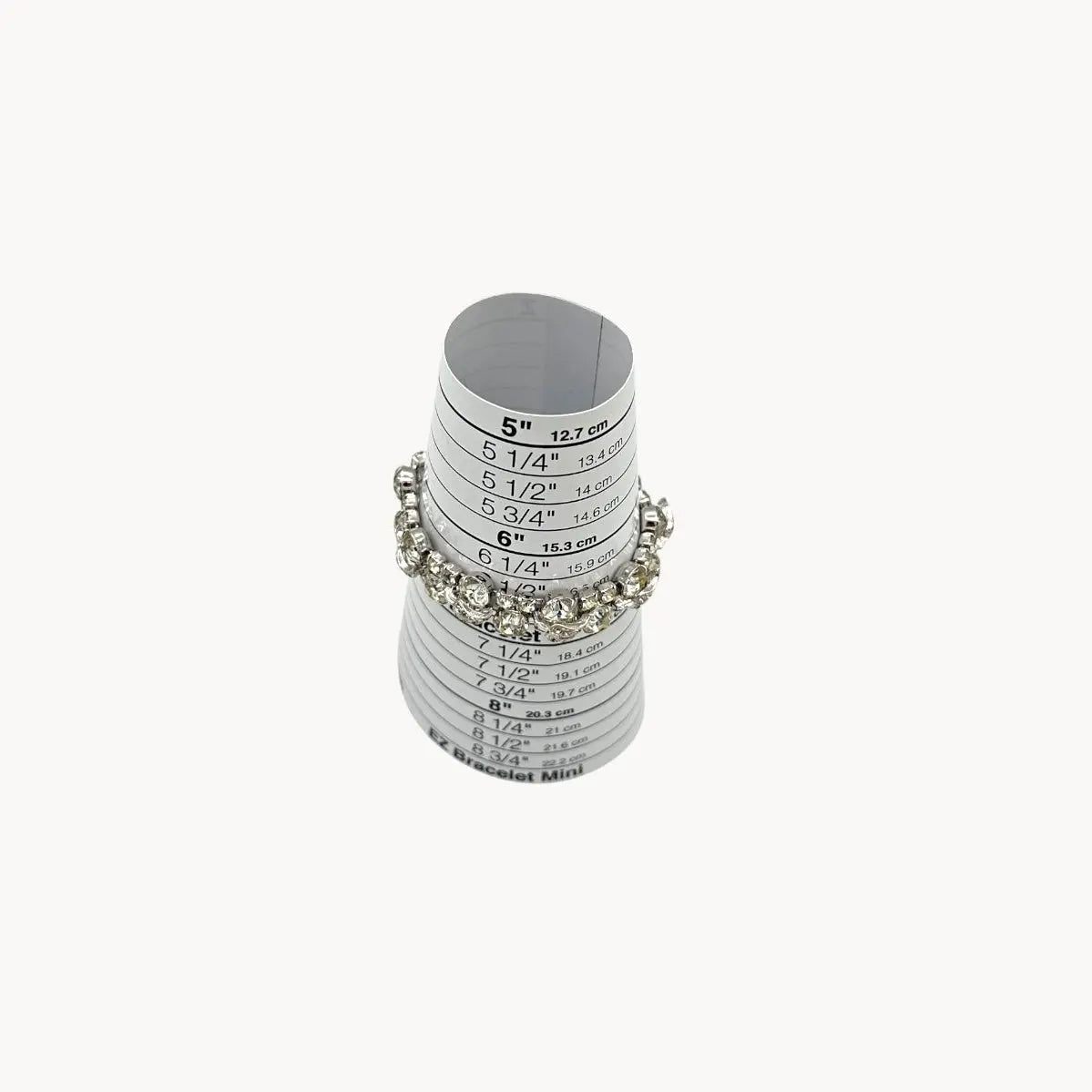 On sizer view of Vintage Weiss rhinestone statement bracelet with large prong-set stones.